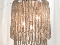 Lamp clad in chainmail tubes